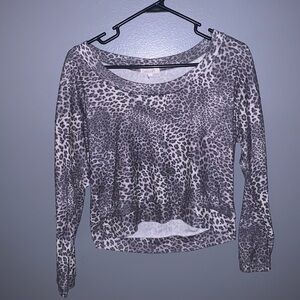 Delia’s gray leopard print crop top.